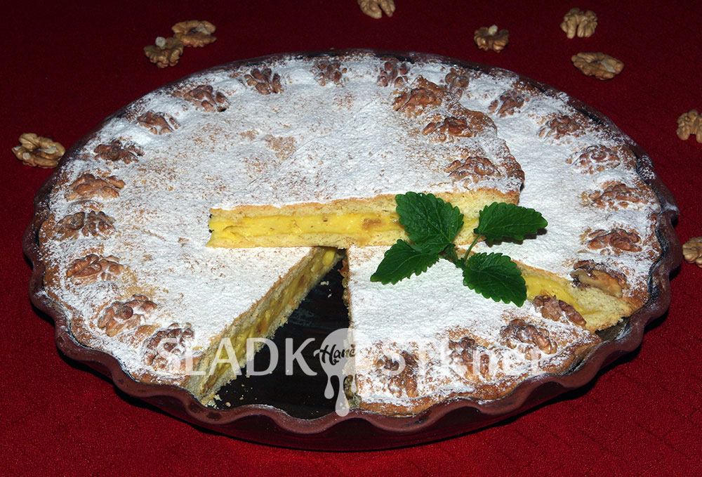 Tvarohový koláč s pudinkem a ořechy